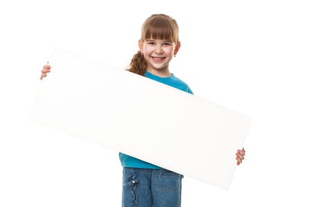 Portrait of a  smiling girl holding blank sheet against white background  Advertising concept  Isolated on whiteの写真素材