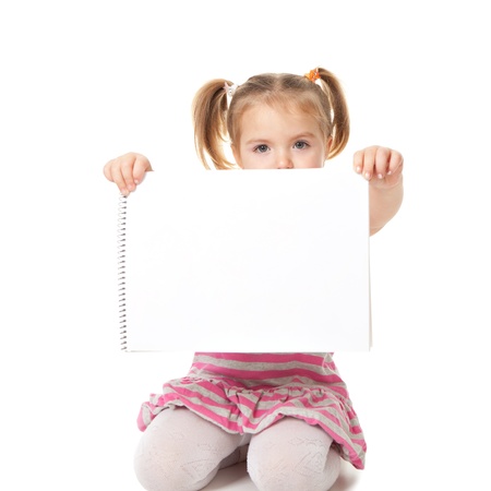 child with white sheet on a white background. Advertisement conceptの写真素材