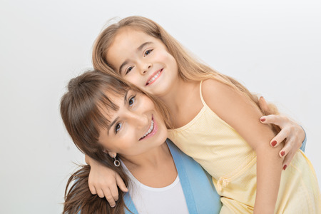 Picture of mother and daughter with flowers. Mother day conceptの写真素材