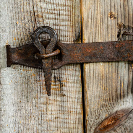 An old hand-made door lock.の写真素材