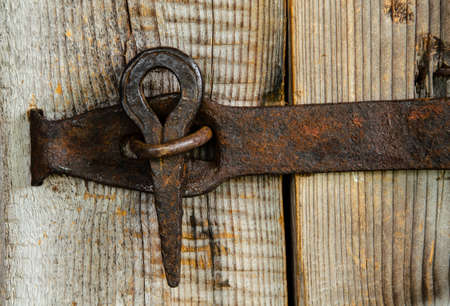 An old hand-made door lock.の写真素材