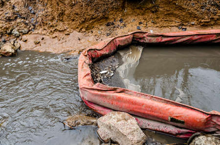 A cleaning structure made of plastic on a stream.の写真素材