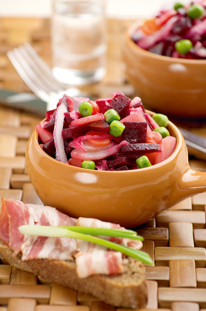 a salad of mixed diced vegetables with mayonnaise.の写真素材