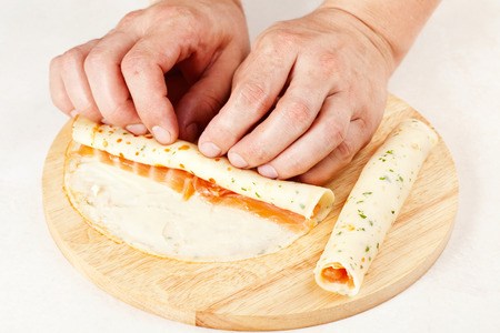 preparation of pita rolls and salmon. preparation of foodの写真素材