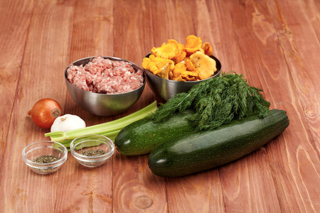 Raw food cooking on a wooden table top. Healthy foodsの写真素材