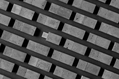 The USB stick made of concrete on a black background.Brutal memory disks of the cement of hand made