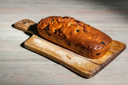 Homemade blueberry cake on a wooden background