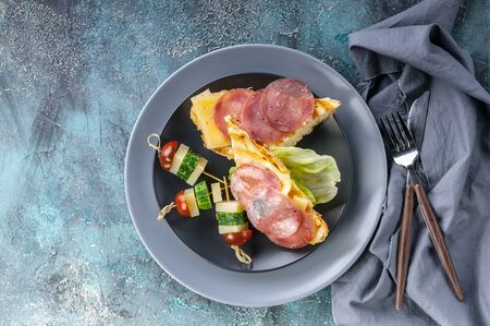 Food banner smoked beef toasts, cheese and spinach. Top viewの写真素材