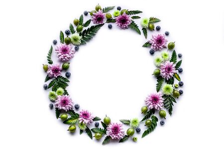 Round frame flowers and berries pattern. Floral Template for wedding or greeting card on a white...