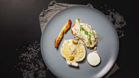 Baked scallop on a shell with cheese and creamy sauce. Cooking at home using recipes restaurant. Top...