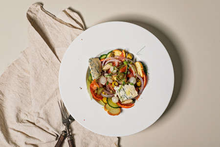 Vegetable salad with bloody orange and blue cheese. Vegetarian dish. Detox food. Top view. Copy spaceの写真素材