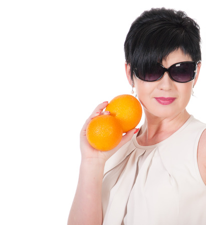 beautiful woman with orangeand sunglasses.の写真素材