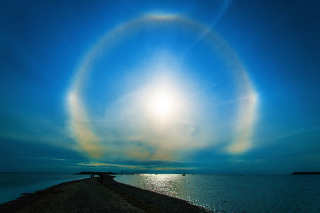 beautiful cloud and sun rays on a sea の写真素材