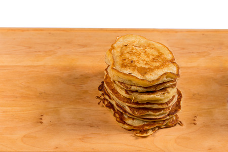 Delicious homemade pancakes on a wooden tableの写真素材
