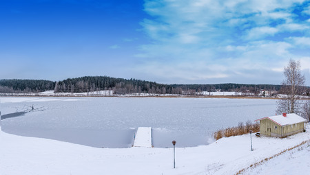 Snow and frozen lake in  central Finland, Himos, Jamsaの写真素材