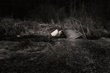 old wooden bridge in a forestの写真素材