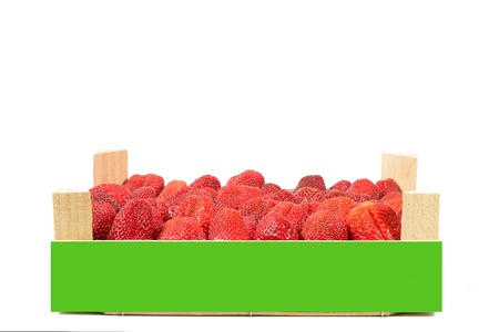 tasty spanish strawberries freshly collected on a wooden boxの写真素材