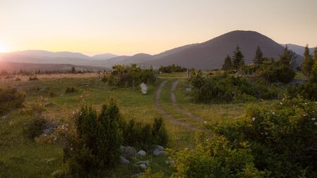 Mountain landscape in Montenegro at sunset. Colorful light on the plain.の写真素材