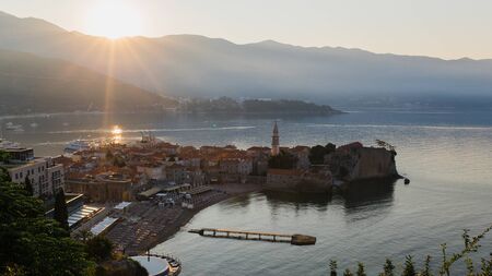 The old city in Budva, Montenegro. Bay in the soft morning light of the sun.の写真素材