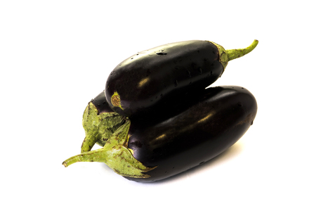 Three eggplants on white backgroundの写真素材