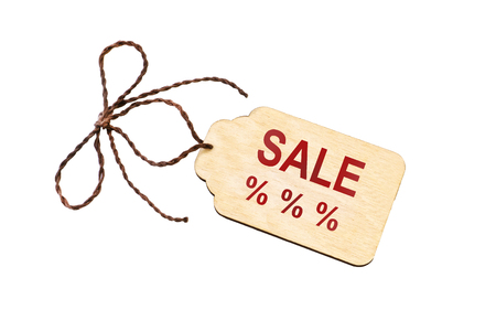 Beige tag with a lace on a white background and an inscription discountの写真素材