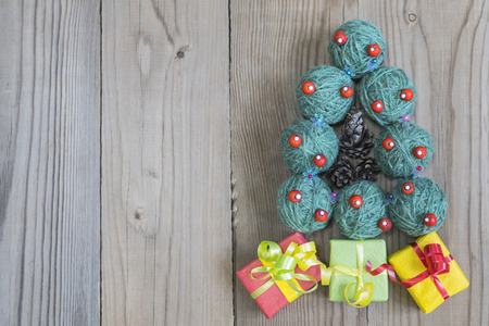 New Year's spruce from woolen yarns greenの写真素材