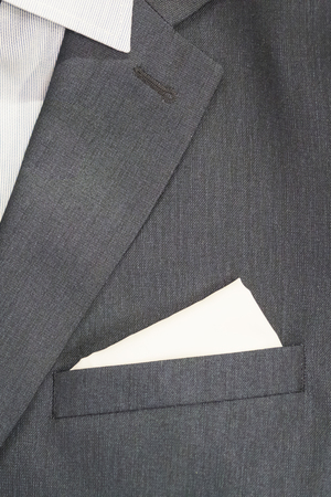 Business men's suit. In his pocket is a white kerchief. A symbol of the purity of transactions. Accuracy in business.の写真素材