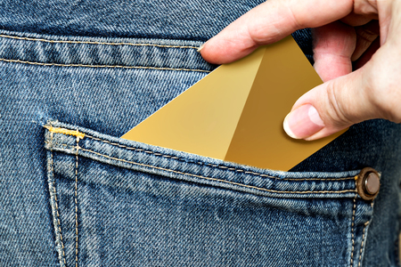 The hand pulls the phone out of the jeans pocket. Theft on vacation.