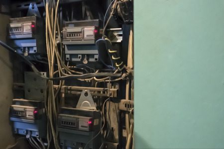 Cabinet with electric meters counters. The arrival of an apartment house. Energy.