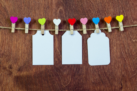 On a string, clothespins in the form of hearts. Valentine's Day. Love, relationships.の写真素材