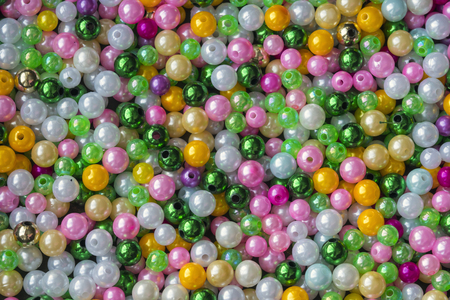 Multicolored beads close-up. Background and textureの写真素材