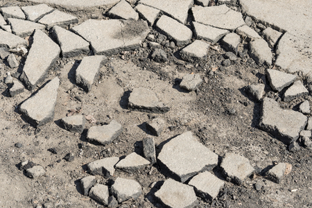 asphalt road is broken, road surfaceの写真素材