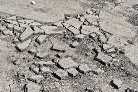 asphalt road is broken, road surfaceの写真素材