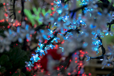 Christmas decorations, neon garlands, glowing flowers, the interior of the new yearの写真素材