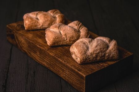 hot pastry, apple strudel, on a wooden board, new year and christmas, traditions