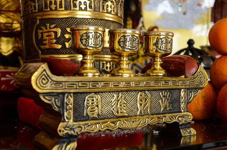 Chinese offering and buddha cup