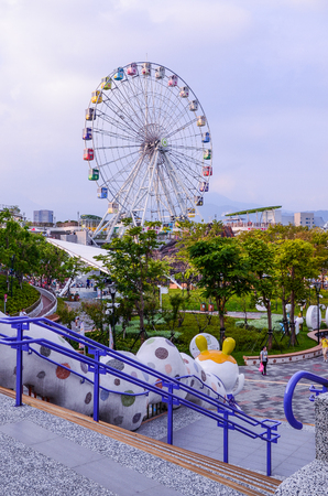 Ferris wheel and recreation facilities In Taipei Children's Amusement Parkのeditorial素材