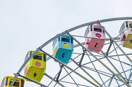 Ferris wheel on the background of blue sky in Taipei