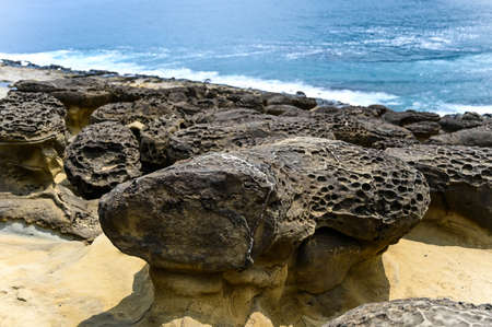 Mushroom rock by the sea.