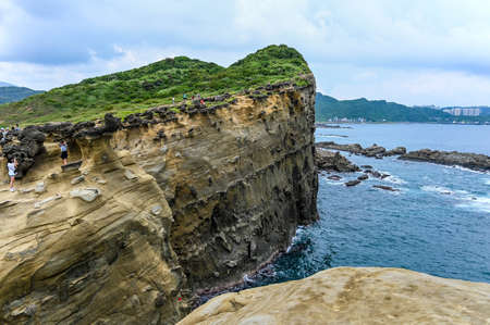 Photo pour New Taipei, Taiwan-SEP 14, 2019: Many people come to visit trunk rock in Shenao Cape. - image libre de droit