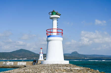 Pingtung, Taiwan-JAN 24, 2021: There are two small lighthouses here in Xing Sha Wan Beach at Houbihu Harbour in Pingtung, Taiwanのeditorial素材