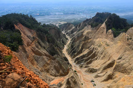 Flaming Mountain is located at the junction of Sanyi Township and Yuanli Township in Miaoli County,...