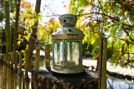 Candle Lit Lanterns placed outdoorsの写真素材