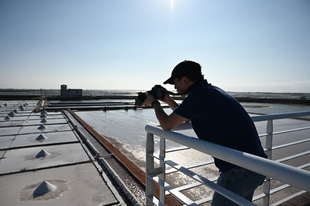 Tainan City, Taiwan - NOV 19, 2022: Tourists are visiting the Jingzaijiao Tile- Paved Salt Fields in Tainan, Taiwan.のeditorial素材
