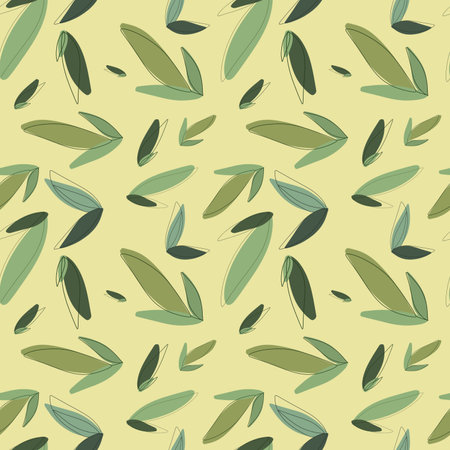 Delicate summer pattern with different green leaves, a repeating seamless pattern for various products, for fabric, paper, etc.の写真素材