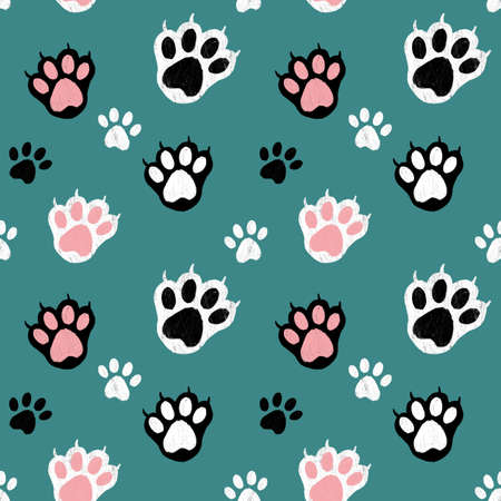 Seamless pattern with different paws on a turquoise background, pattern for world cat day. Can be used as fabric, wrapping paper, etc.の写真素材