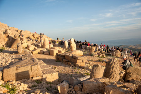 Adiyaman ,Turkey - 05/29/2010: Nemrut Mountain, Adiyaman, Turkey.Local and foreign tourists watch the sun rise and go to the mountain slope to see the ancient ruins.のeditorial素材