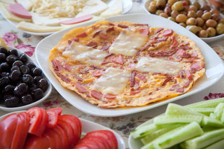 Sausage omelette and traditional Turkish breakfastの写真素材