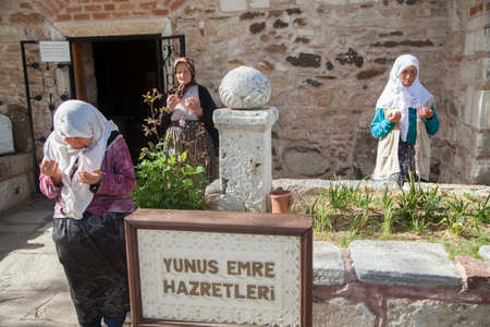 Manisa,Turkey - 04-20-2016:Yunus Emre shrine, muslim women prayingのeditorial素材