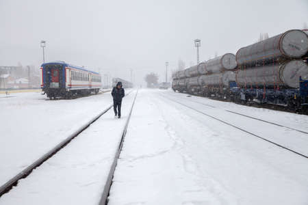 Kars  Turkey - 01-24-2016: Unknown person walking near the station in winter day.のeditorial素材